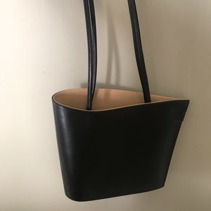 Black Tiffany and Fred handbag.